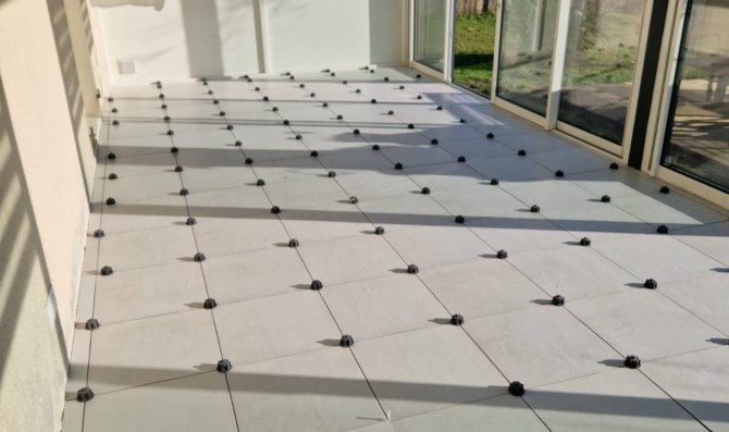 pose de carrelage veranda